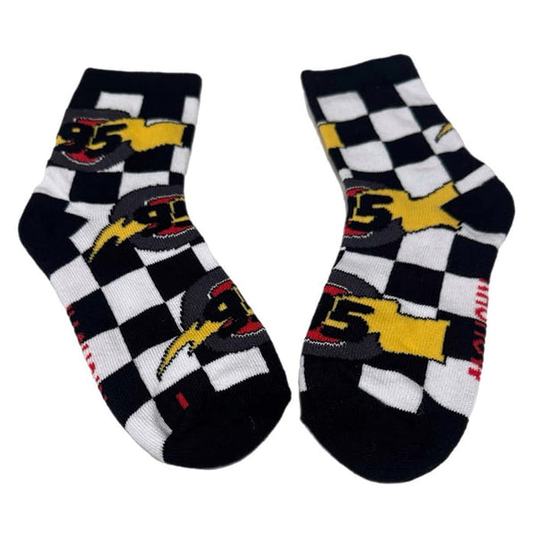 Checkered socks with racing-themed design on a white background - Ledger Nash Co